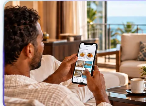 Guest ordering room service from a smartphone while relaxing in a hotel suite